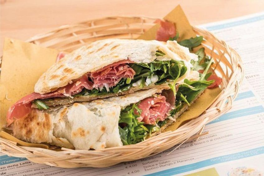 A sandwich in a basket. 4
