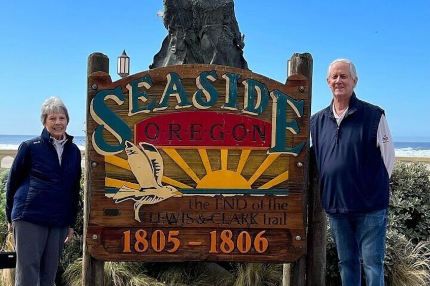 A wooden sign with 'SEASIDE OREGON' and 'the END of the CLYWES & CLARK trail 1805-1806' written on it. 3
