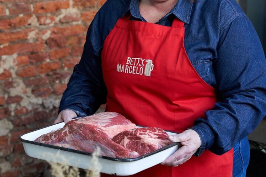 You will have a front-row seat with a direct view of the grill, where you can see how the asado is prepared from raw until it is served on your plate. 2