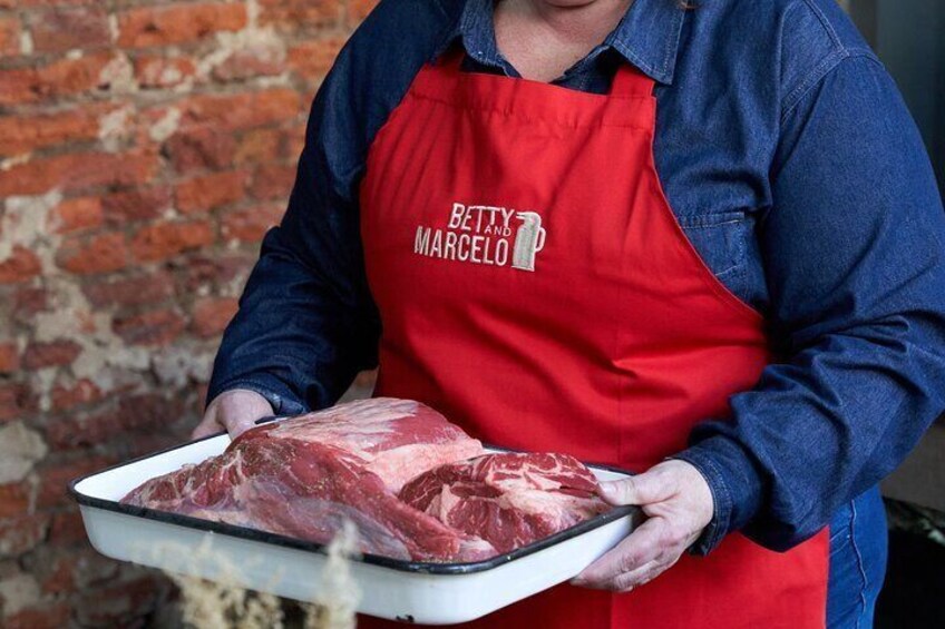 You will have a front-row seat with a direct view of the grill, where you can see how the asado is prepared from raw until it is served on your plate. 2