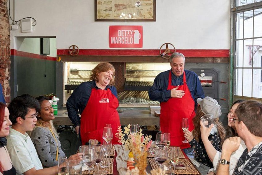 You will have a front-row seat with a direct view of the grill, where you can see how the asado is prepared from raw until it is served on your plate. 1