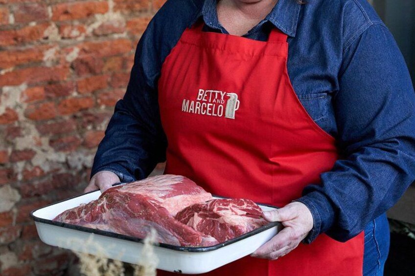 You will have a front-row seat with a direct view of the grill, where you can see how the asado is prepared from raw until it is served on your plate. 2