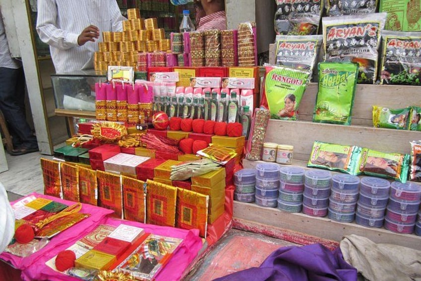 A variety of packaged goods on display, including snacks and beverages. 2