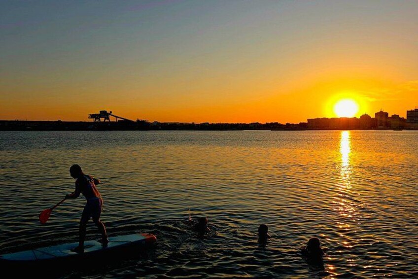 Swimming and SUP boarding during our sunset trips 5