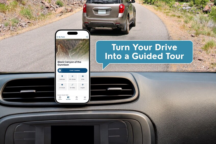 A smartphone mounted on a car dashboard displaying a guided tour app for the Black Canyon of the Gunnison. 3