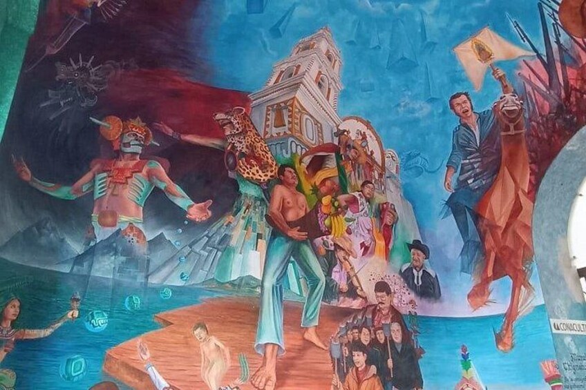 A mural with figures in traditional attire, a building, and a body of water. 2