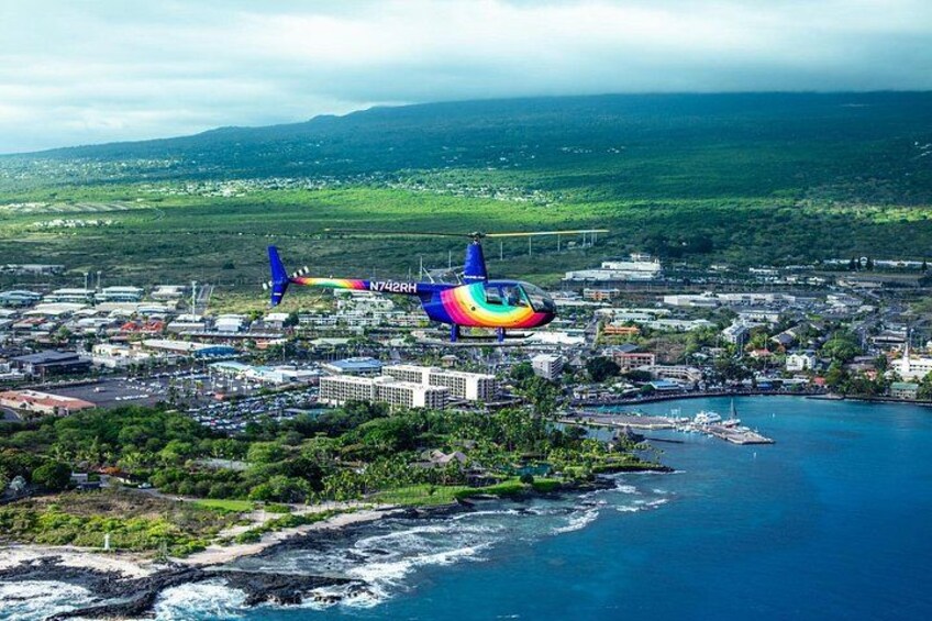 Soar over the pristine waters of Kailua Bay and the vibrant Kailua-Kona 4