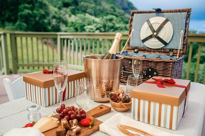 A luxury experience awaits with a private landing, featuring champagne, Hawaiian juices, Ka’u Coffee chocolates, and beautifully crafted flower leis 1