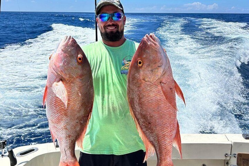 Reeling in mutton snappers off Key West with Cowboy Cowgirl! Book your offshore adventure today! 2