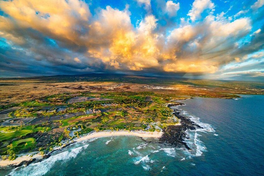 Explore Kona's breathtaking coastline shadowed only by the towering volcanic formations 2