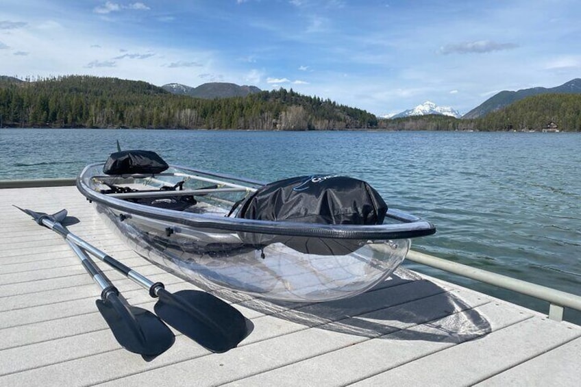 Clear Kayak on the dock of Lake 5 with views of Glacier Park