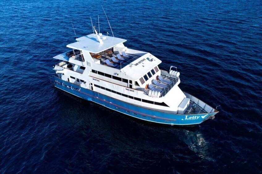 A large, multi-deck boat named Letty on the water. 1