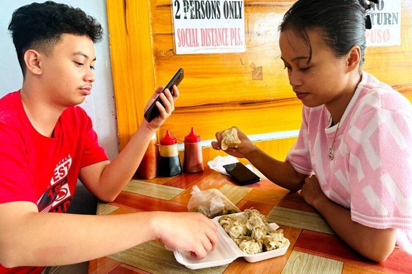 Siomai sa Tisa: Indulge in Cebu's famous siomai, a flavorful and juicy dumpling, popular for its unique taste and served with a spicy dipping sauce. 3
