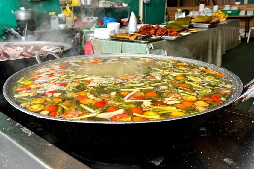 Kuya Simon's Larangan: Savor the rich flavors of tangigi and mamsa fish in a hearty, savory soup, a beloved Cebuano seafood delicacy 4