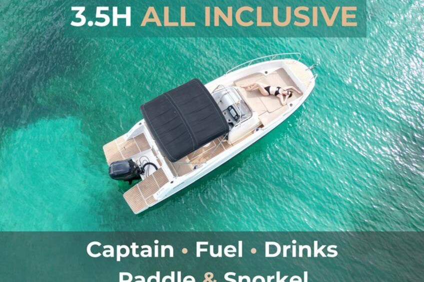 A boat on turquoise water with amenities like a captain, fuel, drinks, paddle, and snorkel. 1