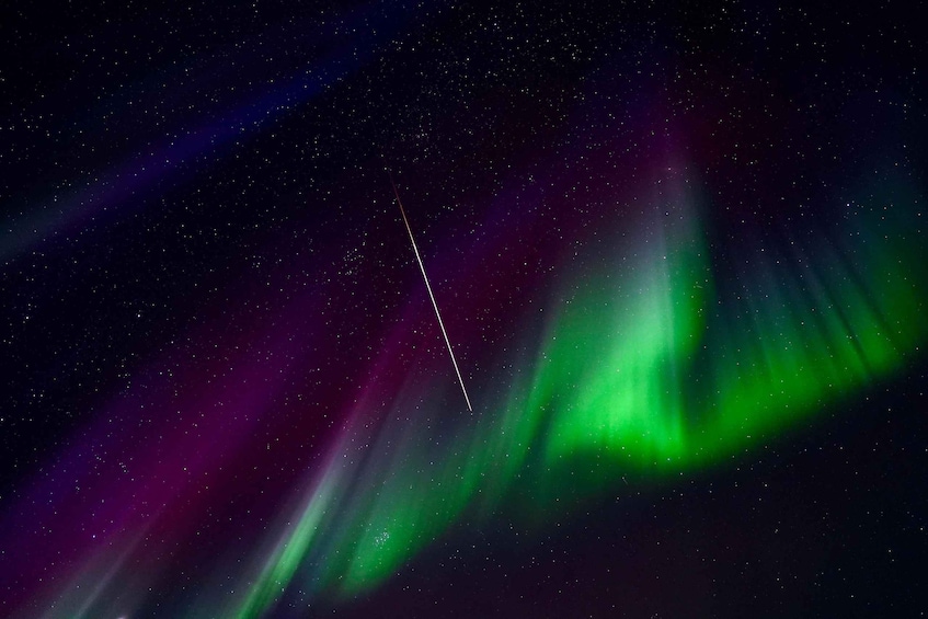 The Northern Lights with green and purple hues. 2