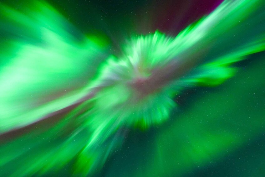 A starry night sky with green aurora lights. 4