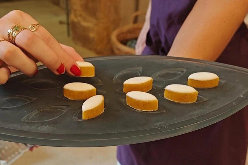 Two people run a calisson d’Aix in a large calisson factory in the world, emblematic specialty of Aix-en-Provence. 4