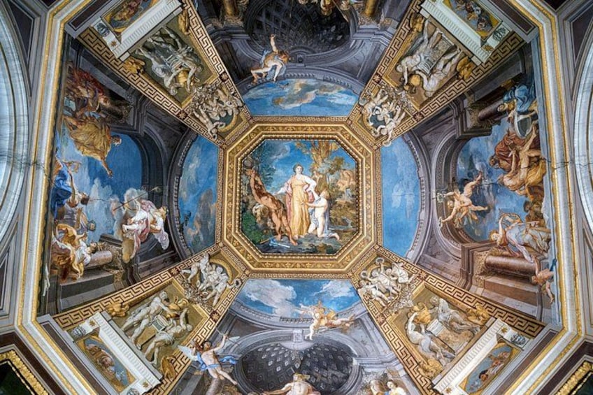 A detailed ceiling fresco with classical figures and architectural elements. 4