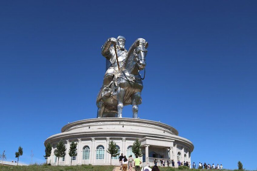 A large statue of a man on horseback on a circular pedestal. 2