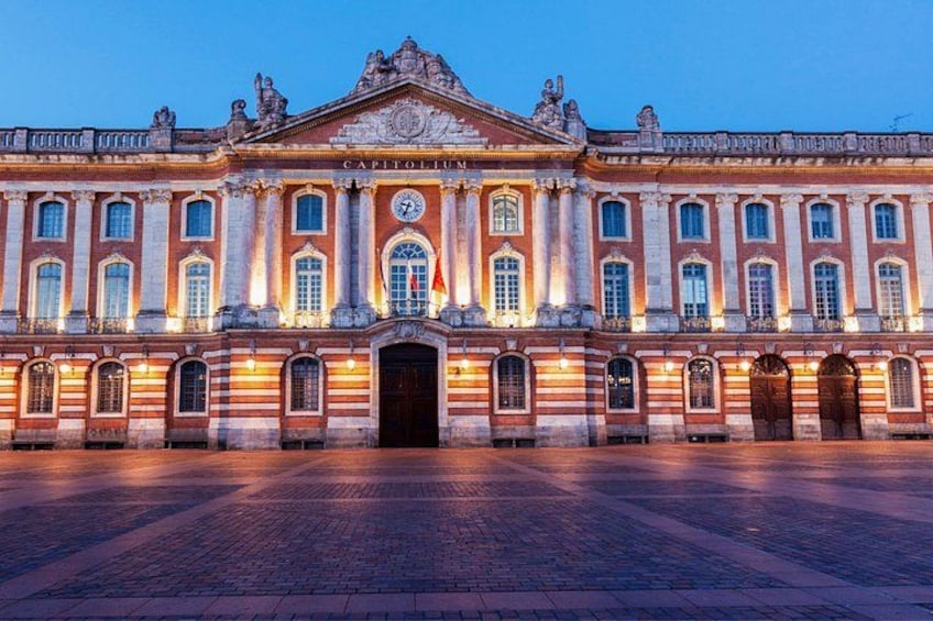 The Louvre Museum's facade at dusk. 2