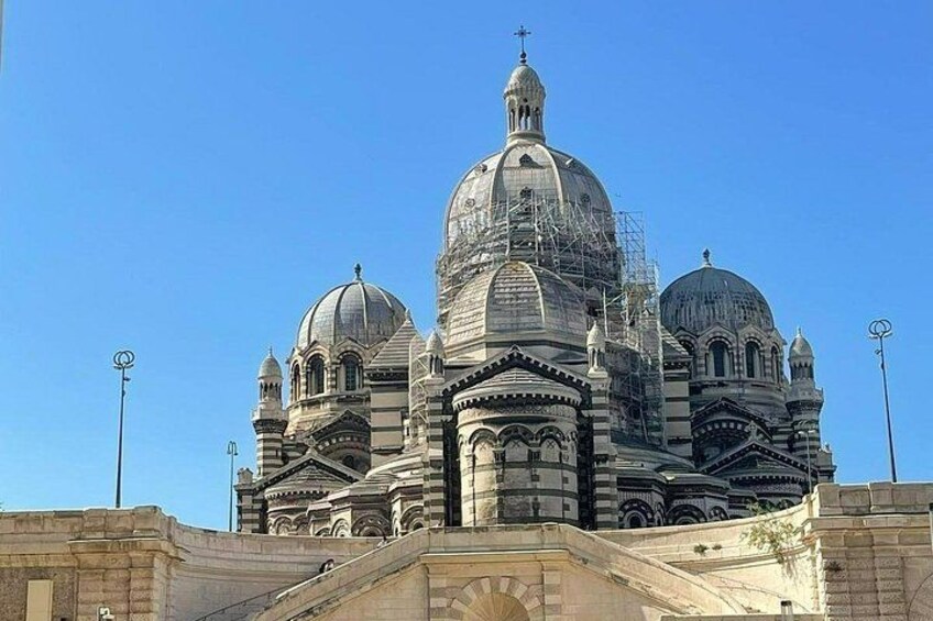 A large, ornate church with multiple domes and intricate architectural details. 3
