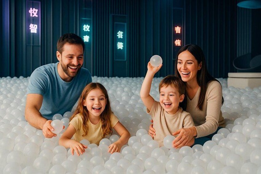 Family enjoying the ball pit 2