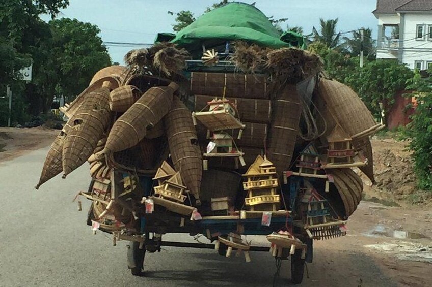 Local remork transport their hand made handicrafts to sell along the road. 5