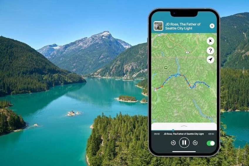 Un teléfono inteligente mostrando un mapa con una cadena montañosa y un lago al fondo. 2