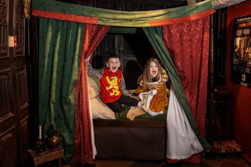 Lie on a four poster bed! 2