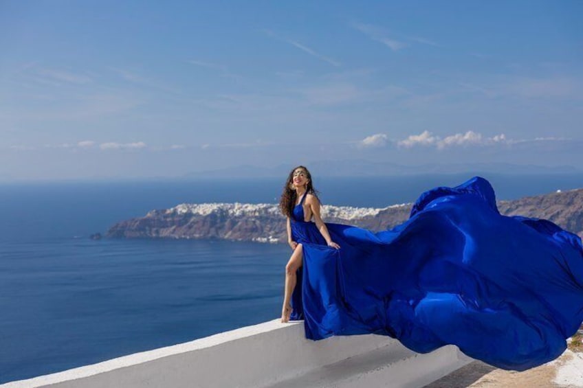Royal blue flying dress with bell tower in Megalochori 3