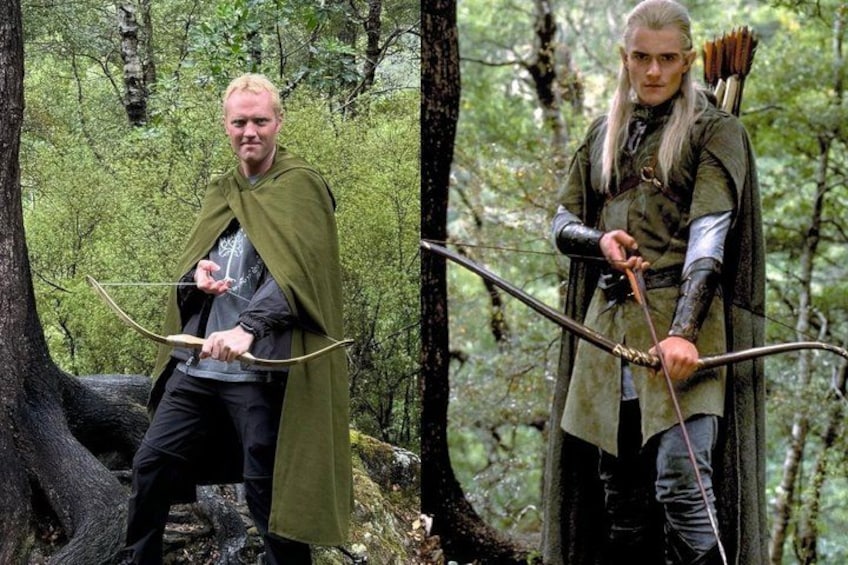 A person in a forest holding a bow and arrows. 2