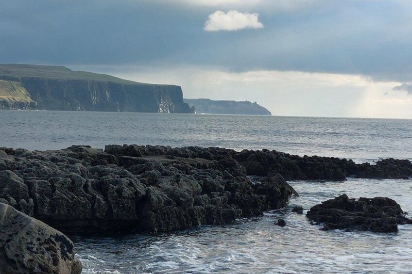 A rocky coastline with cliffs and waves. 2
