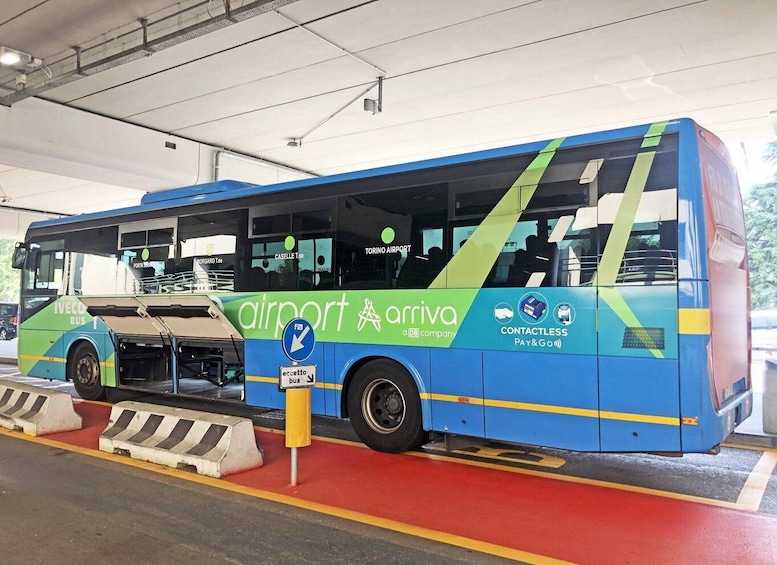 A blue and green bus with 'airport arriva' and 'contactless pay & go' logos. 2