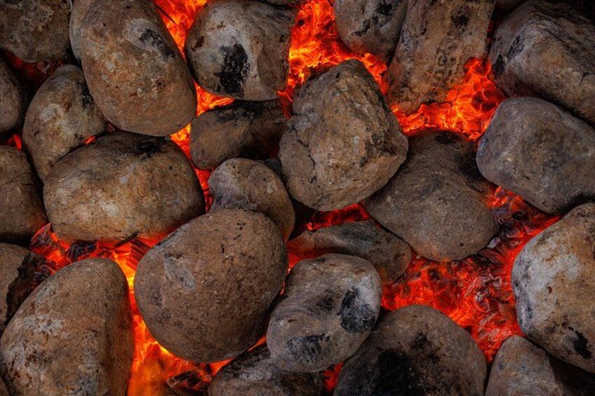A close-up of glowing hot coals. 4