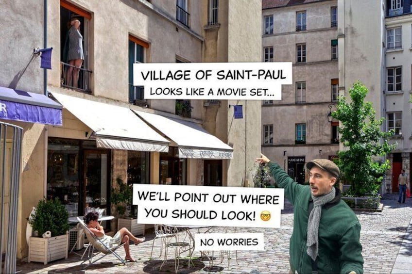 A European village with buildings, outdoor seating, and a person pointing. 2