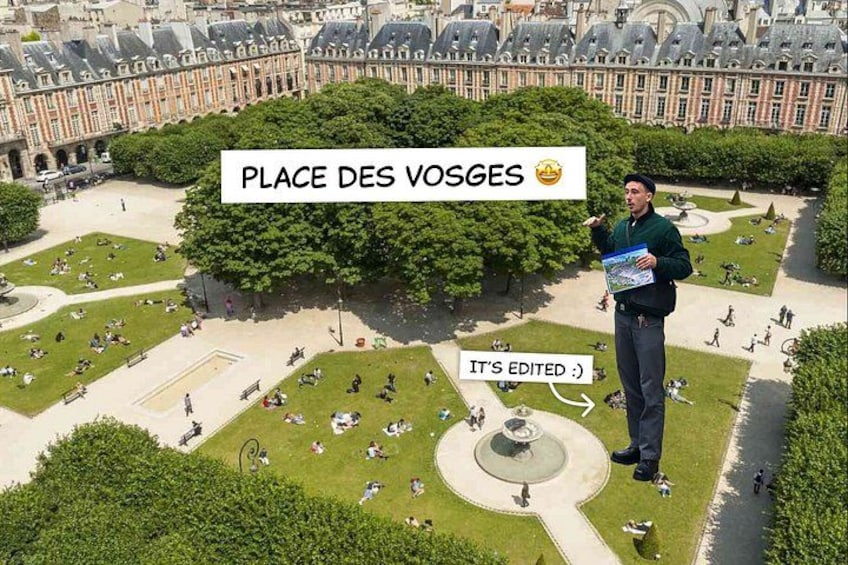 A person standing in a large, open square with a book, surrounded by trees and buildings. 4