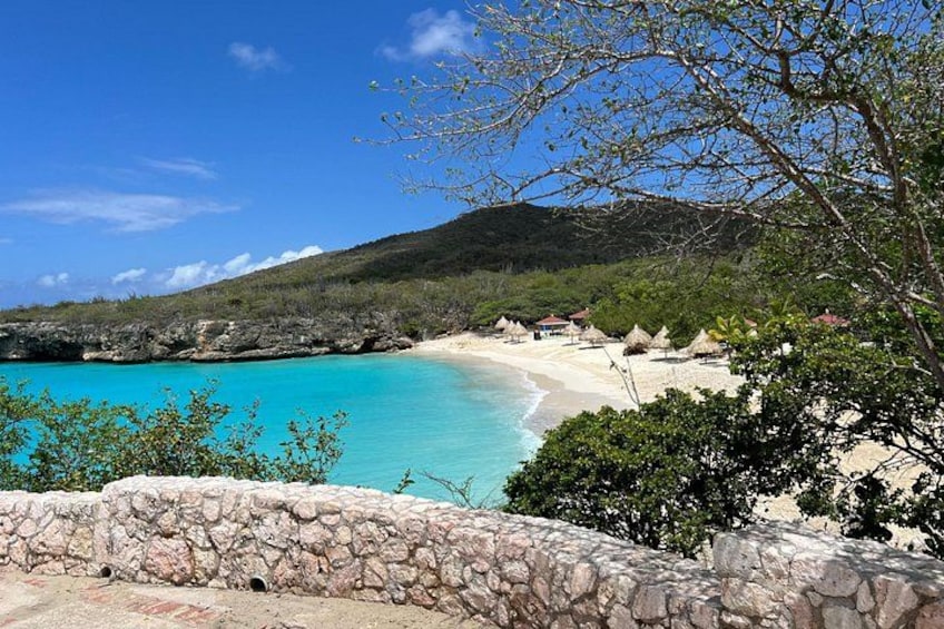 Nestled between lush cliffs, this paradise boasts soft white sands and vibrant sea hues, making it the perfect spot for relaxation and awe-inspiring coastal beauty. 3