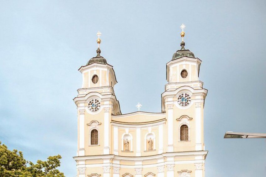 Walking tour stop at the famous wedding church in Mondsee, a well-known filming location in Austria’s Lake District. 4