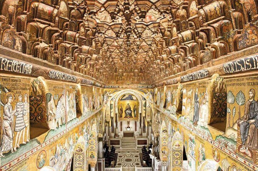 A grand hall with intricate mosaics and columns. 1