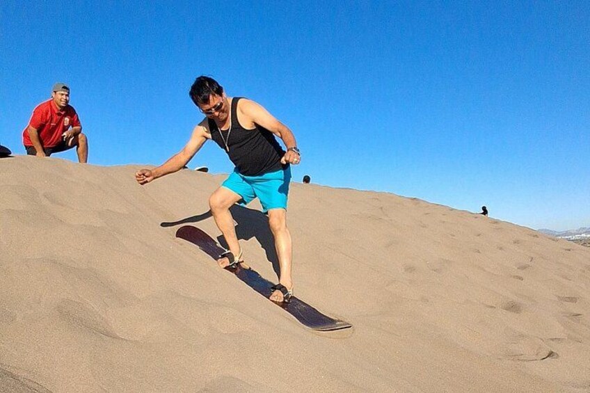 Sandboarding in the Mogote Sand Dunes in La Paz 2