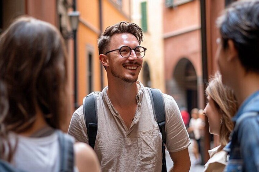 A person with a backpack walking through a narrow street with buildings on either side. 4