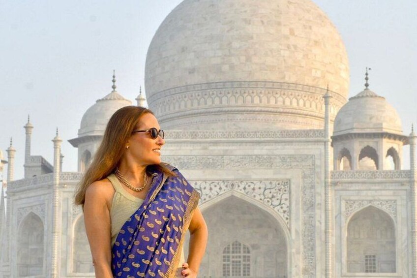 A person standing in front of the Taj Mahal. 3
