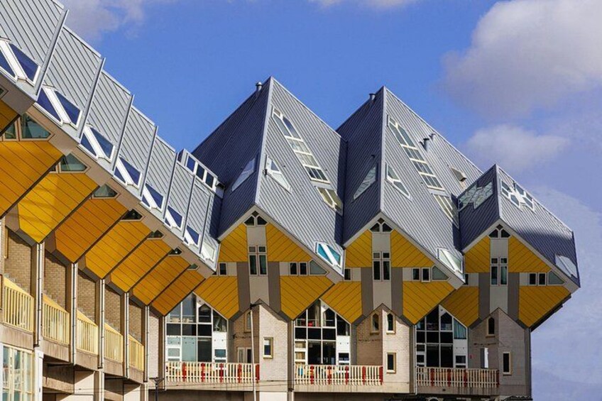 A modern building with geometric shapes and yellow accents. 5