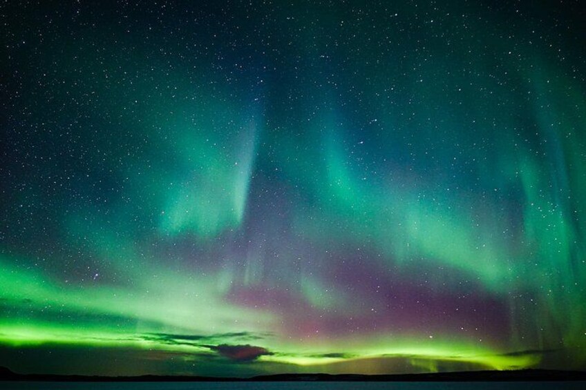 The Northern Lights over a landscape. 4