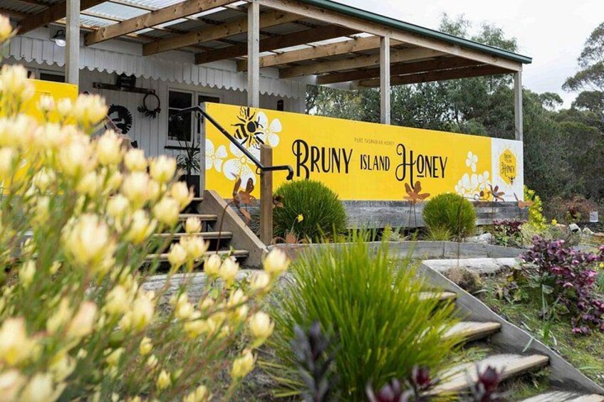A building with a yellow sign reading 'Bruny Island Honey.' 2