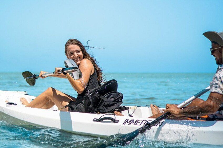 A person in a boat on the water. 2