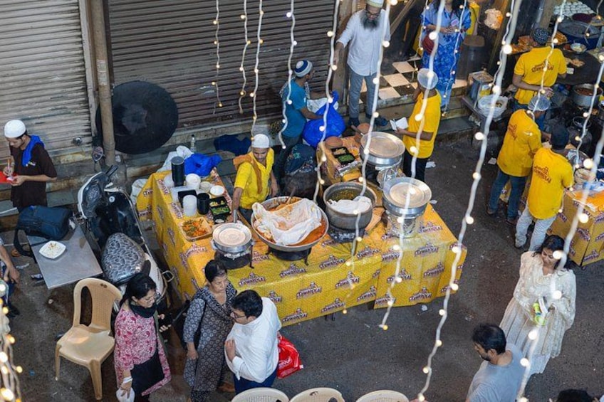 Ancient traditions meet modern life in the narrow alleys of Old Mumbai. 2
