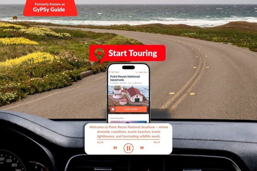 Een smartphone bevestigd aan een dashboard, waarop een toeristische app voor het Point Reyes National Seashore staat. 1