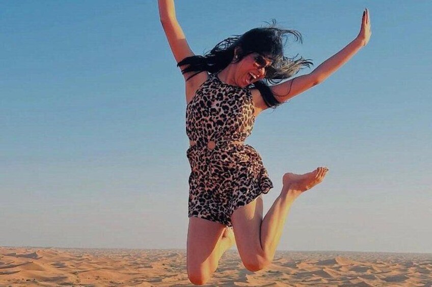 A person jumping in a desert landscape. 2